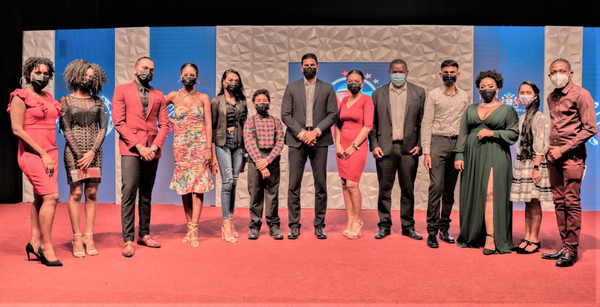 The winners at the prize-giving event. From left, an official from the Ministry of Culture, Youth and Sports, finalist Curtela Lewis, Joel Dudhnath, Nia Allen, Sonia Singh, Logan Simpson, Minister of Culture, Youth and Sports Charles Ramson, Cassie Adams, an official of the ministry, Roberto Teekah, Quanisha Patterson, Kaysheena Singh and Darius Austin. (Photo compliments of the Ministry of Culture, Youth and Sports Facebook page)
