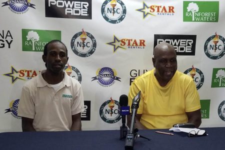 Seasoned distance athlete, Cleveland Thomas (left) and Vice-Chairman of the organising committee, Orin Thomas at the briefing yesterday.