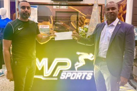 GFF President Wayne Forde (right) receives the sponsorship cheque from MVP Sports Managing Director Ian Ramdeo.