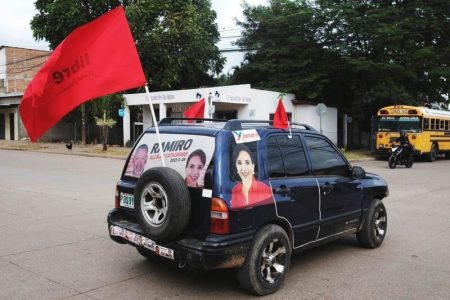 Xiomara Castro’s photo emblazoned on a car. Reuters (Jose Cabezas)