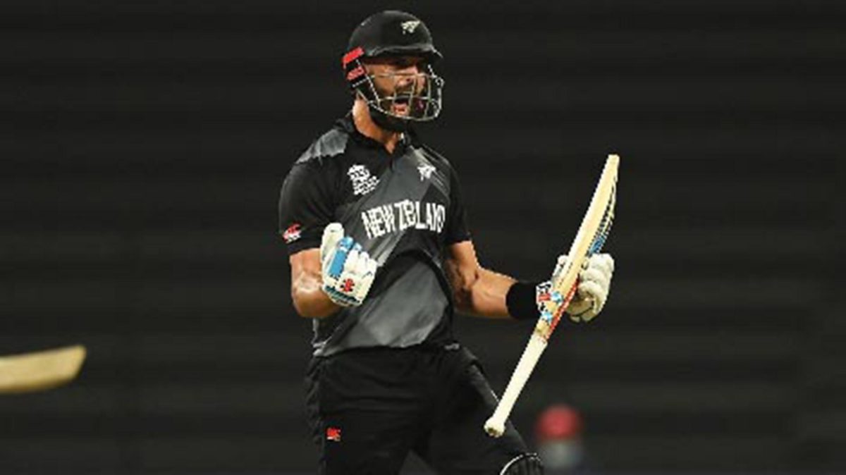 Daryl Mitchell celebrates after hitting the winning runs as New Zealand beat England in the semi-final of the T20 World Cup. 