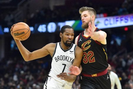 Cleveland Cavaliers forward Dean Wade (32) defends Brooklyn Nets forward Kevin Durant (7) in the second quarter at Rocket Mortgage FieldHouse. Mandatory Credit: David Richard-USA TODAY Sports