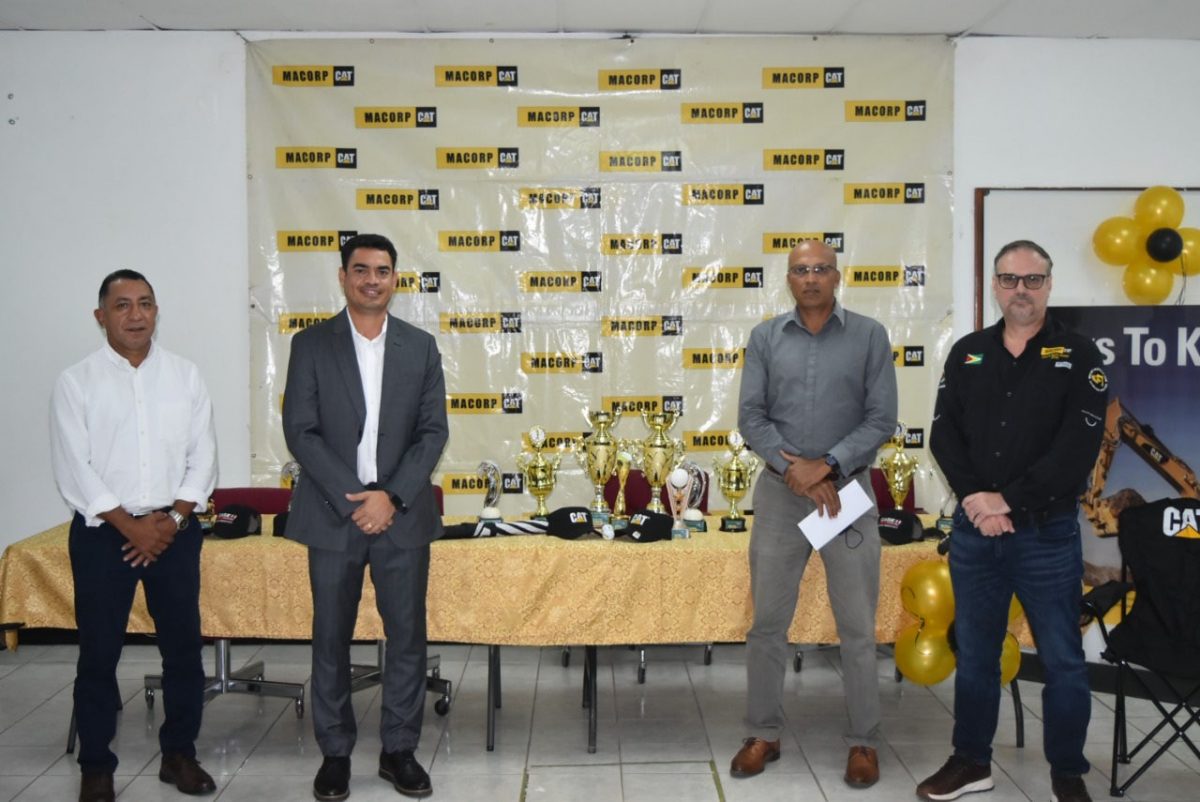 Chief Executive Officer of MACORP, Guillermo Escarraga (second left) and Lusignan Golf Club president Patanjilee Persaud (second right) with other officials of MACORP at the launch yesterday.
