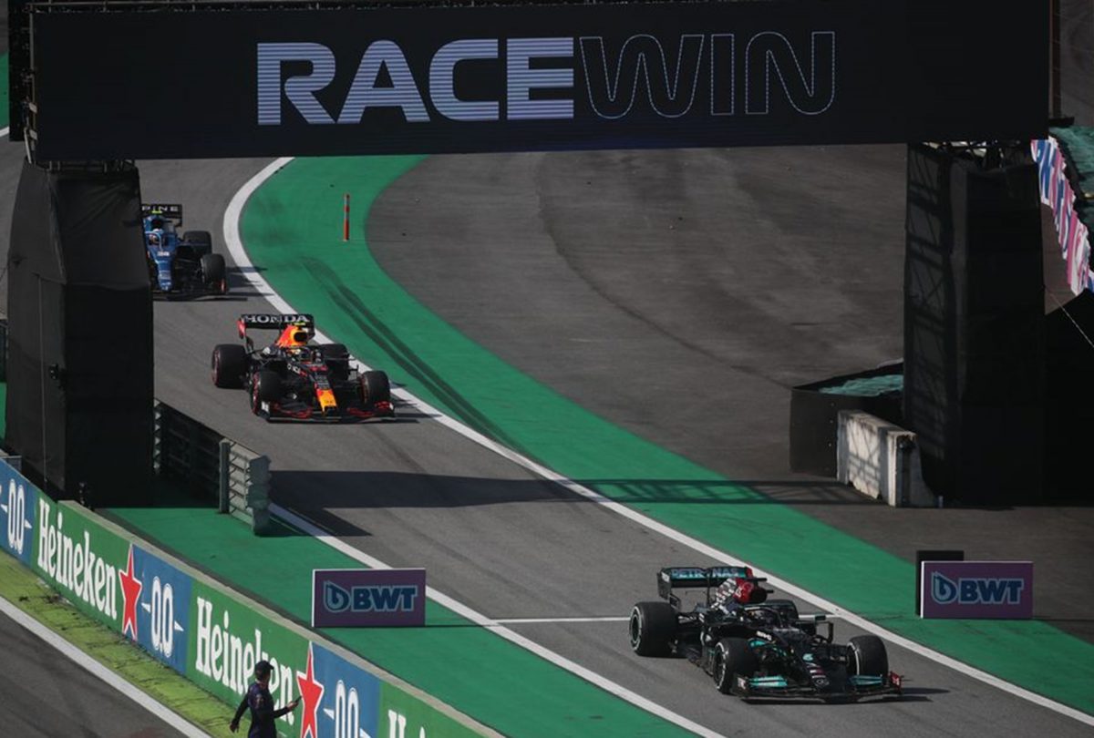 Mercedes’ Lewis Hamilton crosses the finish line to win the race REUTERS/Ricardo Moraes 
