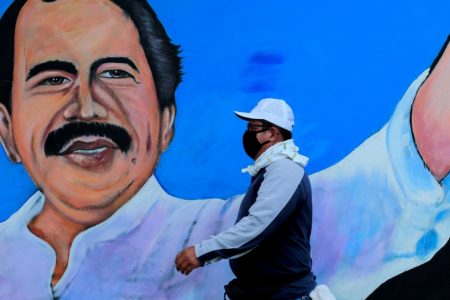 A man walks by a mural depicting Nicaraguan President Daniel Ortega, in Managua, Nicaragua, March 30 2020. Picture: REUTERS/OSWALDO RIVAS