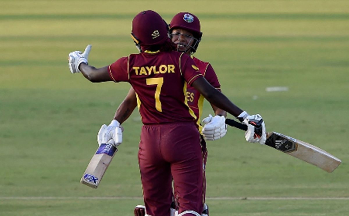 Captain Stafanie Taylor and Chedean Nation embrace following West Indies Women’s victory yesterday.
