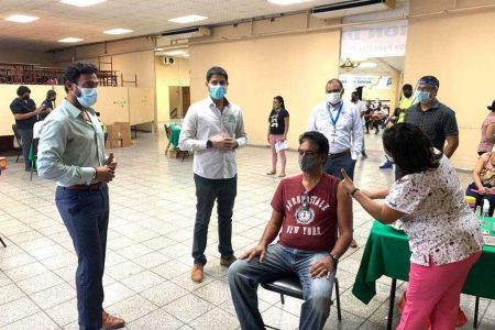 FLASHBACK - A member of the public is vaccinated at the Centre Pointe Mall in Chaguanas in June.