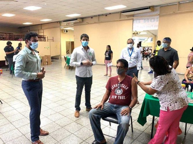 FLASHBACK - A member of the public is vaccinated at the Centre Pointe Mall in Chaguanas in June.