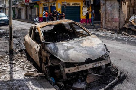 The remains of a burnt car in Pointe-a-Pitre, on the French Caribbean island of Guadeloupe, following days of rioting against Covid-19 measures, on Nov 21, 2021.PHOTO: AFP