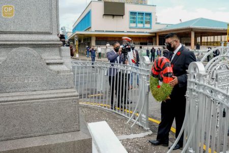 Remembering the war dead: President Irfaan Ali preparing to lay a wreath yesterday at the Cenotaph as part of the annual Remembrance Day Ceremony. (Office of the President photo)