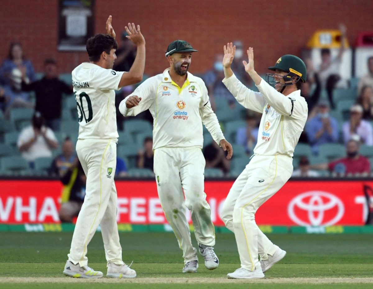 Australia's Nathan Lyon (centre) celebrates taking the wicket of England's Jos Buttler with teammates REUTERS/Morgan Sette