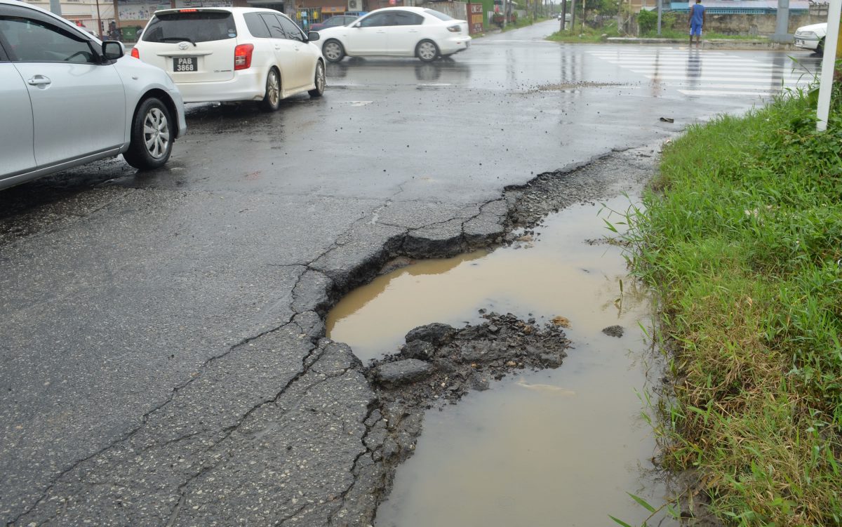 A pothole near the junction (Orlando Charles photo)