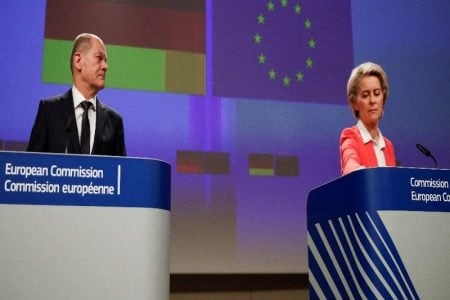 European Commission President Ursula von der Leyen attends a news conference with German Chancellor Olaf Scholz at the European Commission in Brussels, Belgium, December 10, 2021. REUTERS/Johanna Geron