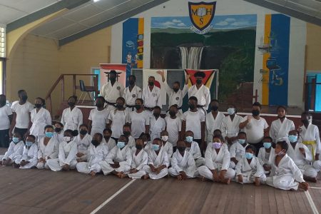 Participants of the recent IKO Academy of Guyana grading examinations pose for a photo at the conclusion of the forum