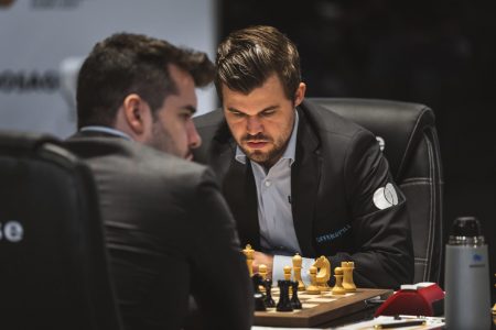 World Chess Champion Magnus Carlsen (right) contesting the 2021 World Championship Match with Grandmaster Ian Nepomniachtchi in Dubai, UAE (Photo: Niki Riga) 