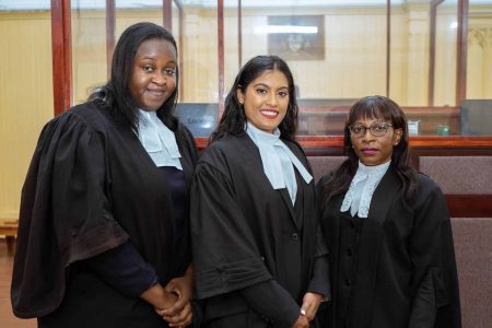 Moonmattie Seitaram (centre) with Justice Simone Morris-Ramlall (right) and attorney Tuanna Hardy