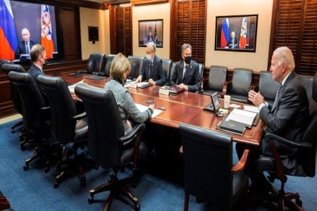 U.S. President Joe Biden holds virtual talks with Russia’s President Vladimir Putin amid Western fears that Moscow plans to attack Ukraine, as Secretary of State Antony Blinken listens with other officials during a secure video call from the Situation Room at the White House in Washington, U.S., December 7, 2021. (The White House/Handout via REUTERS)