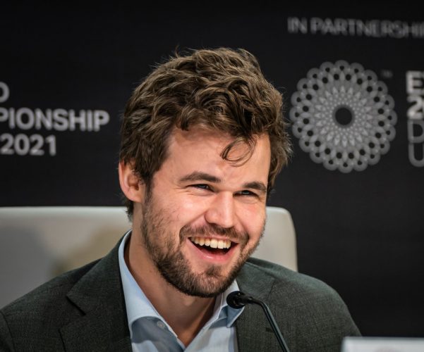 World Champion again! Norway’s Magnus Carlsen is all smiles as he wins the world chess championship for a fifth consecutive time.  (Photo: Eric Rosen /FIDE)