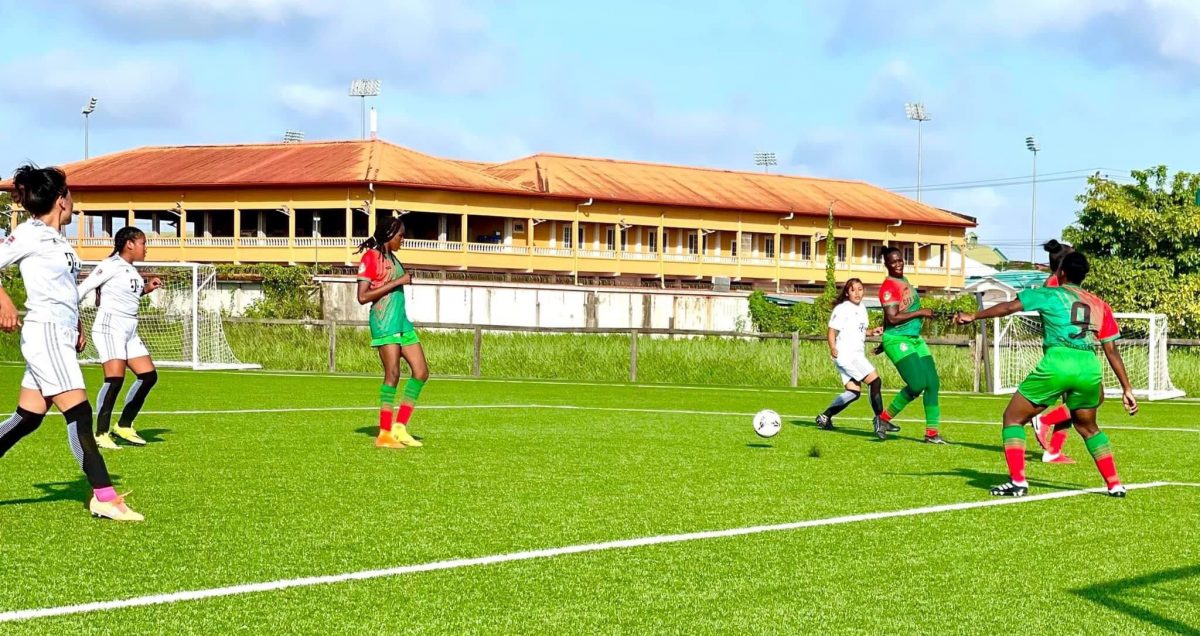 Action between GDF (green) and Upper Mazaruni in the (GFF)/GNWFA Super-16 Women’s Festival at the National Training Centre, Providence yesterday.