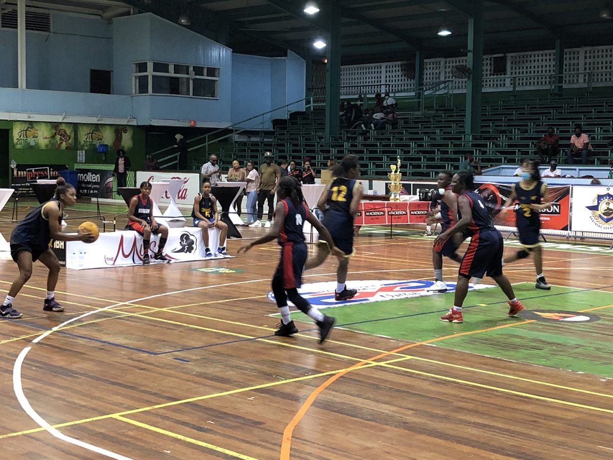 A Scene from the Georgetown and Kwakwani   female exhibition matchup at Friday night’s launch of the Rawle Toney 3x3 Classic at the Cliff Anderson Sports Hall.