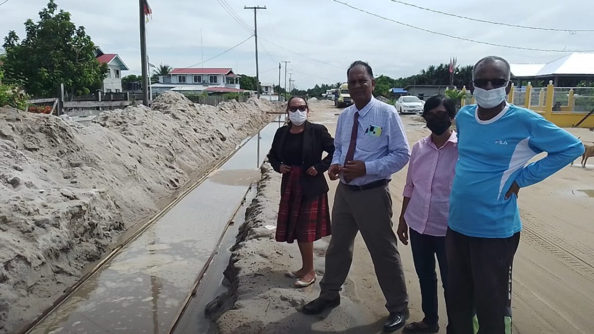 Mayor Rajendra Prabhulall (second from left) and Deputy Mayor Lorna Fitzoz along with councillors inspecting the road. 