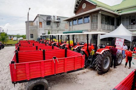 Some of the tractors at a July handing over (Office of the President photo)