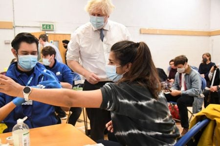 British prime minister Boris Johnson visits Stow Health vaccination centre in Westminster, London, Britain on Dec 13, 2021. (Reuters photo)