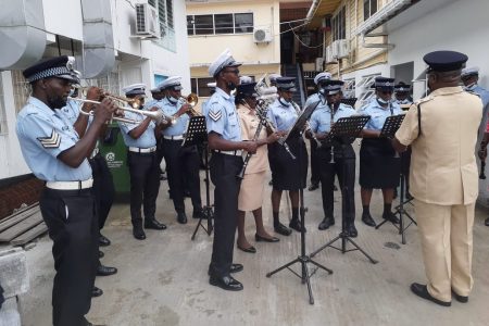 The Guyana Police Force Military Band and Choir under the direction of ASP Joseph, the Director of Music and Culture, yesterday visited the Georgetown Public Hospital Corporation and the Gafoors Complex at Houston, East Bank Demerara as part of their traditional Christmas caroling activities for the festive season. (Guyana Police Force photo)
