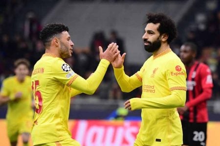 Liverpool’s Mohamed Salah celebrates scoring their first goal with Alex Oxlade-Chamberlain REUTERS/Alberto Lingria