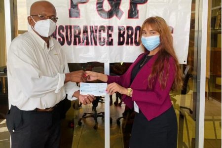 In picture P&P Insurance Brokers Account Executive Urmila Shamsundar, hands over the sponsorship cheque to GTTA’s General Secretary Linden Johnson.
