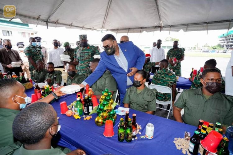 President Irfaan Ali greeting a soldier yesterday. (Office of the President photo)