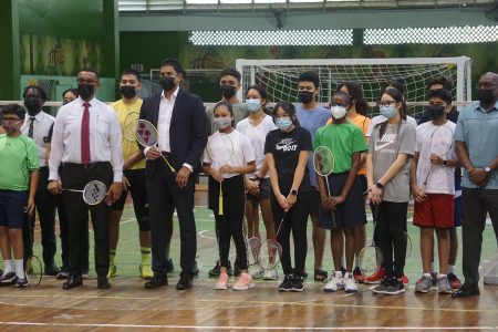 Minister of Culture, Youth and Sport Charles Ramson Jr, standing alongside the participants during the official launch of the Badminton academy. Also in the photo is Director of Sports Steve Ninvalle (right) and NSC Chairman Kashif Muhammad