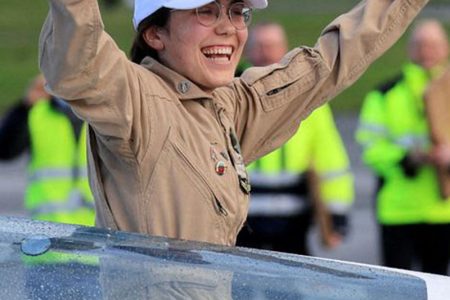Belgian-British pilot Zara Rutherford, 19, gestures following her landing at Kortrijk-Wevelgem Airport, after a round-the-world trip in a light aircraft, becoming the youngest female pilot to circle the planet alone, in Wevelgem, Belgium, January 20, 2022. (REUTERS/Pascal Rossignol photo)