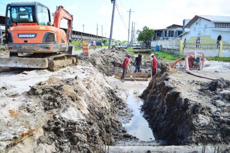 Major drainage works underway at Chapel and Hadfield streets yesterday. (Orlando Charles photo)