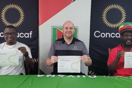 Licensed to Train! From left to right- Assistant Technical Director Bryan Joseph, Technical Director Ian Greenwood and Coaching Mentor Linsworth Gilbert displaying their recently acquired Concacaf B Coaching License
