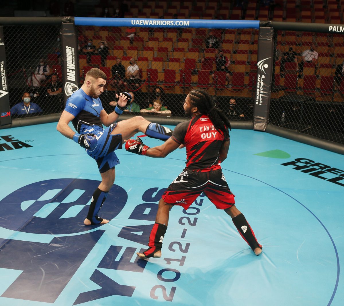 Guyana’s Corwin D’Anjou about to land a right hand on Ireland’s Adam McEnroe during their IMMAF world Championships encounter. (PHOTO COMPLIMENTS: IMMAF) 