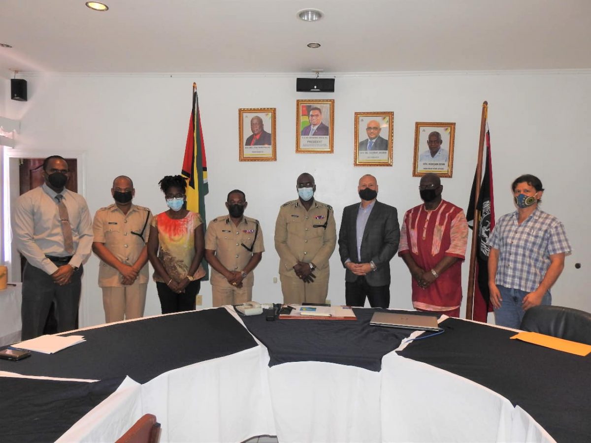 The two sides at the meeting (Guyana Police Force photo)
