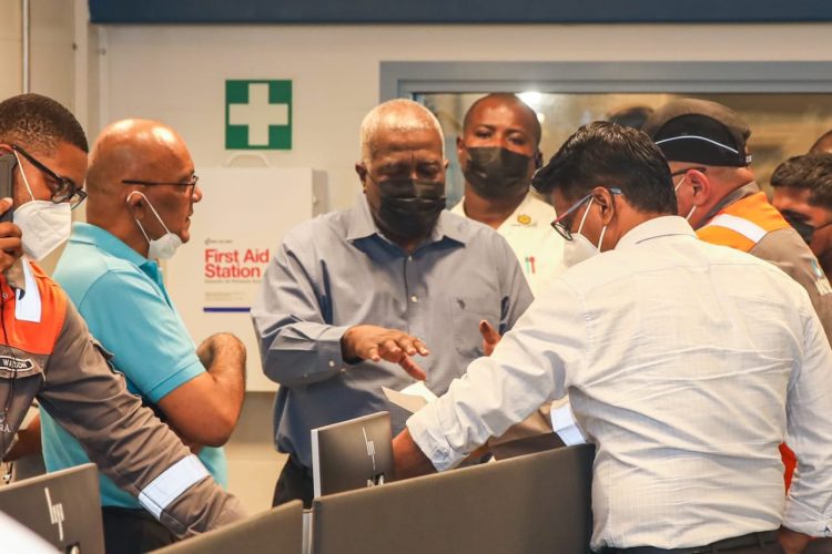 Prime Minister Mark Phillips (centre) at the plant today (DPI photo)