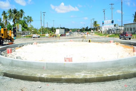 Roundabout works: Work moving apace at the roundabout being constructed to link Mandela Avenue with the new four-lane road beginning at Eccles on the East Bank Demerara.  (Orlando Charles photo)