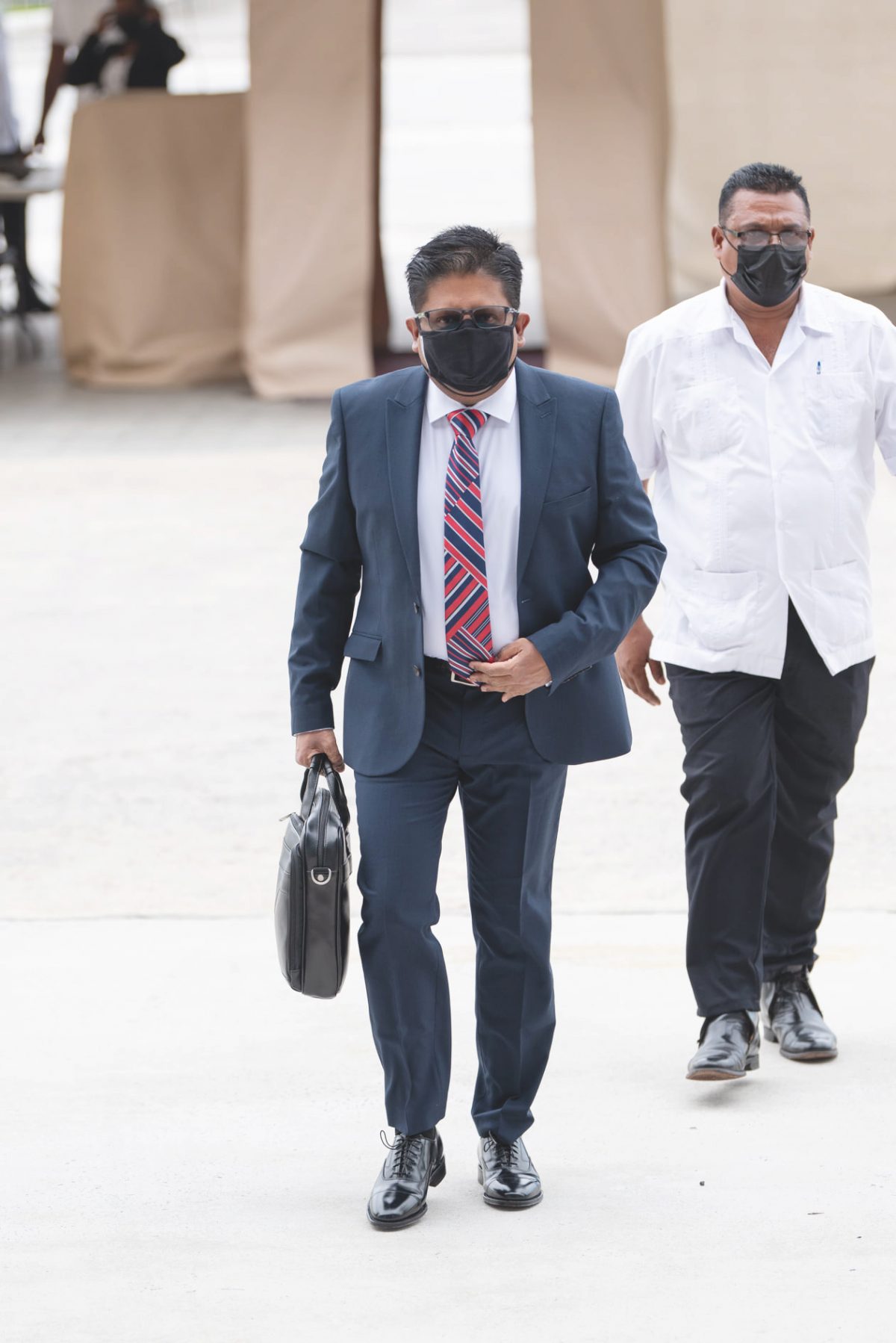 Senior Minister in the Office of the President with responsibility for Finance, Dr. Ashni Singh, arriving at the Arthur Chung Conference Centre on January 26 for the delivery of the budget. (Department of Public Information photo)