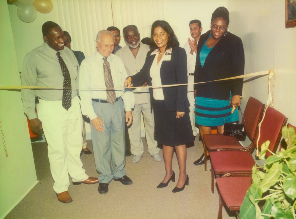 Assistant General Manager, Human Resources, Moneeta Singh about to cut the ribbon to open the  Diamond Institute of Management and Technology in 2005. Yesu Persaud is second from left. 