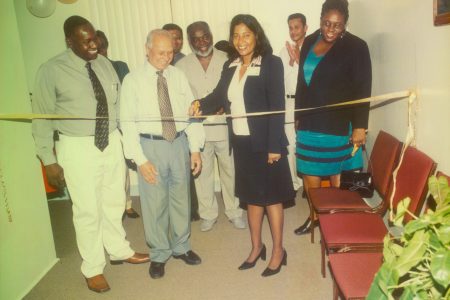 Assistant General Manager, Human Resources, Moneeta Singh about to cut the ribbon to open the  Diamond Institute of Management and Technology in 2005. Yesu Persaud is second from left. 