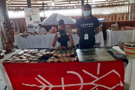 Andrew Campbell, founder of Ebesowana Natural Foods, displaying his products at the ‘Benab Duty-Free Shop’ 