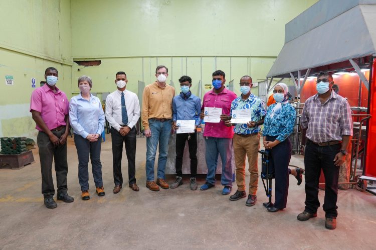 The staff of the New Amsterdam Technical Institute including the trained lecturers pose for a photo. (MoE photo)