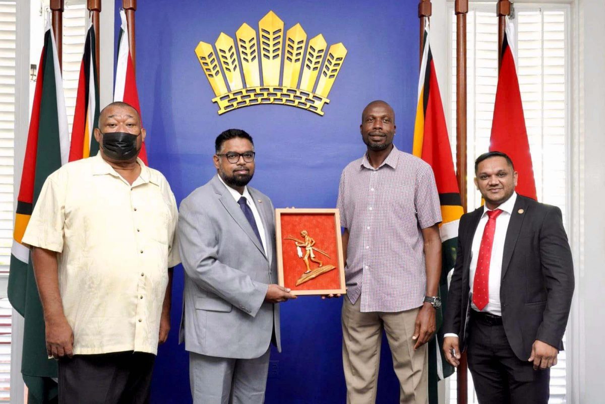 From left to right - BCB president Hilbert Foster, President Irfaan Ali, Sir Curtly Ambrose, and Minister of Natural Resources Vickram Bharrat