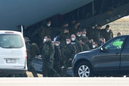 German troops for NATO enhanced Forward Presence battle group reinforcement arrive in Kaunas airport, Lithuania February 14, 2022. REUTERS/Ints Kalnins