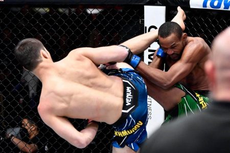 Beginning of the End! - Shavkat Rakhmonov of Kazakhstan landing a right foot spinning heel kick on Guyana’s Carlston Harris which led to the eventual knockout victory via punches during their welterweight clash Saturday.