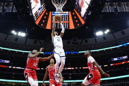 Ja Morant of the Memphis Grizzlies goes up for an easy layup in the game against the Chicago Bulls Saturday night. Mandatory Credit: David Banks-USA TODAY Sports