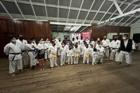Master Frank Woon-A-Tai (extreme right) with representatives of KFC Guyana and members of the Guyana Karate Daigaku.