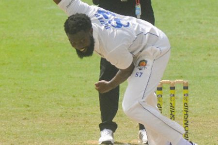 Left-arm seamer Raymon Reifer sends down a delivery during his six-wicket haul. (Photo courtesy CWI Media) 